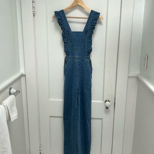 Never worn overalls from Sezane. Size 2 blue denim with adjustable straps.